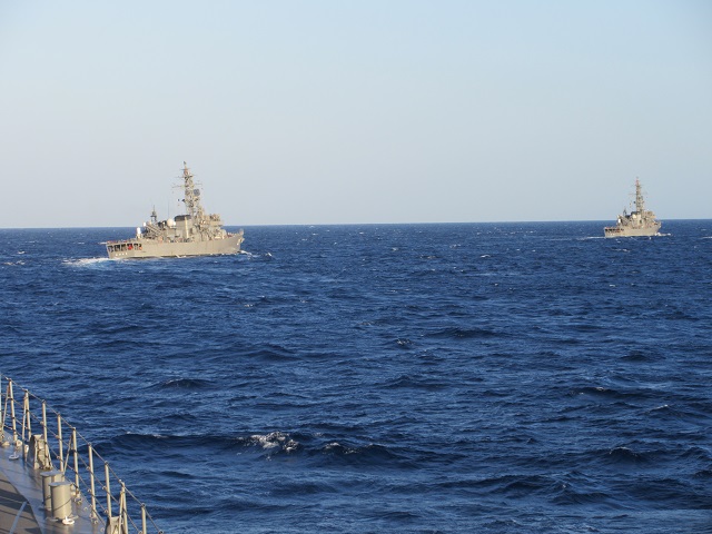 "Abukuma" and "Tone" in a single vertical formation.jpg